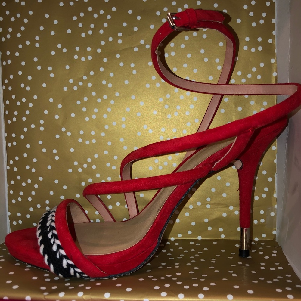 Red strappy pumps